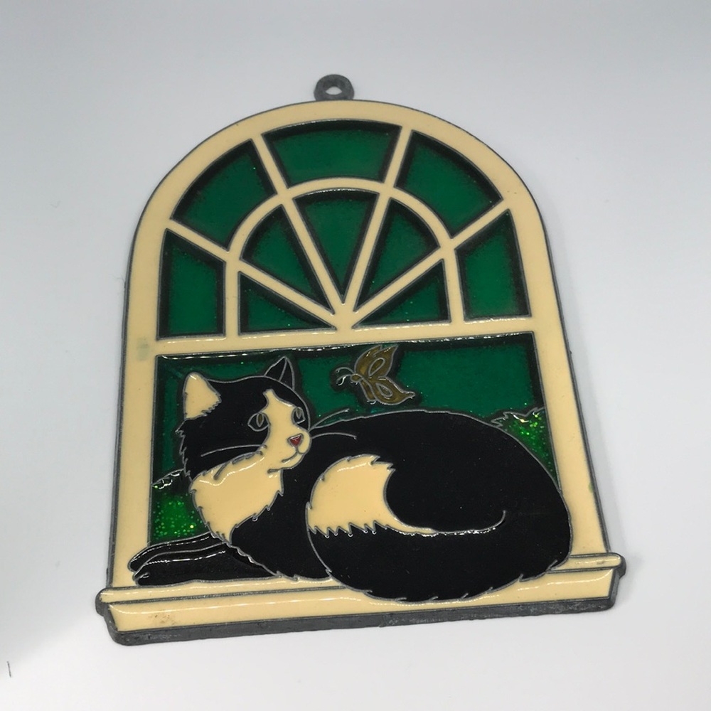 Vintage cat in window stained glass
